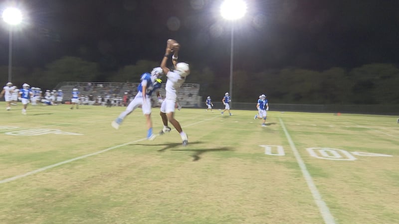 Dawson's Chace Thomas makes a leaping grab.
