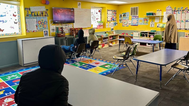 Children watch television at ABC Learning Center in Minneapolis, Minn., on Wednesday, Dec. 31,...