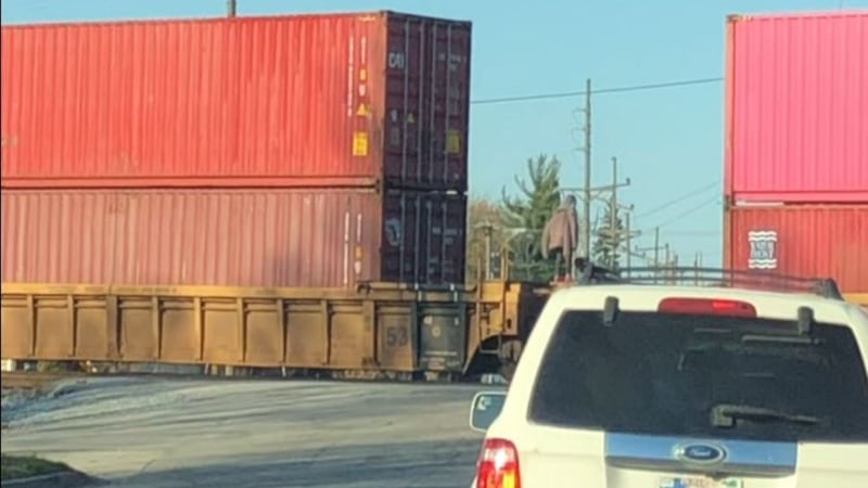 Stunning new video shows a train moving while a child was climbing over to get to school.